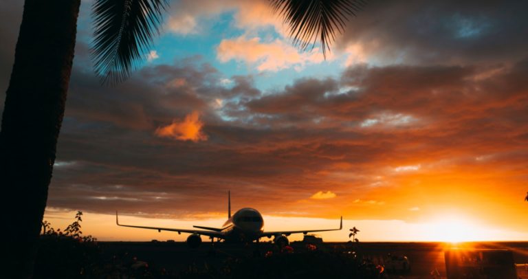 airplane at sunset in KOA