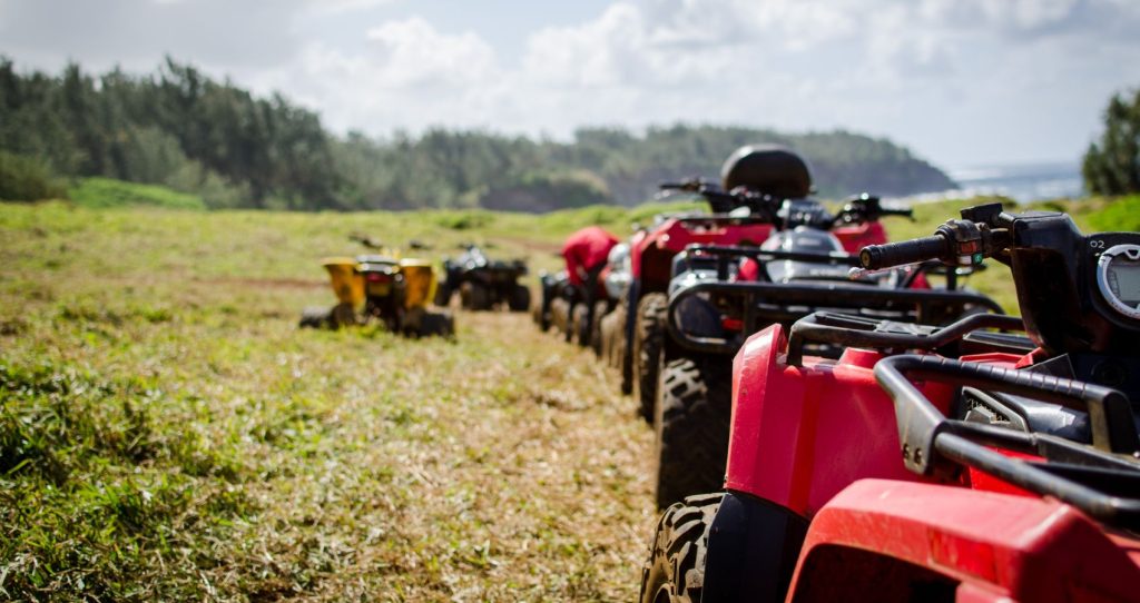 ATV motors lined up for an ATV Adventure Tour on the Big Island, Hawaii
