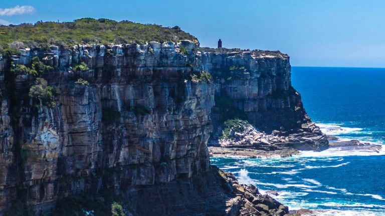 coast with blue waves of water