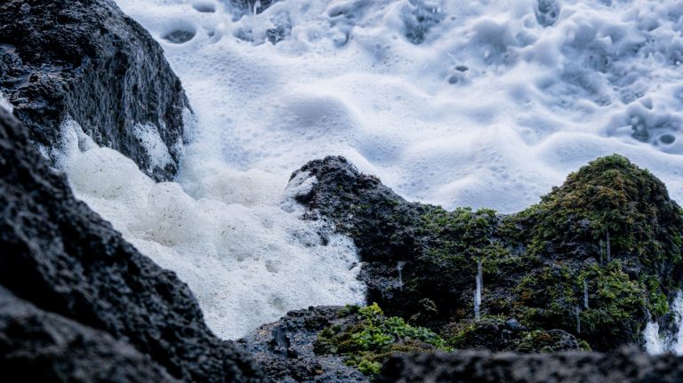 waves crashing over the rocks