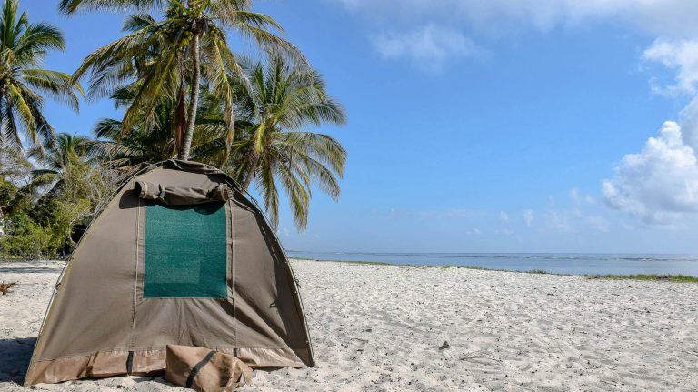 Gray Tent on a white Beach